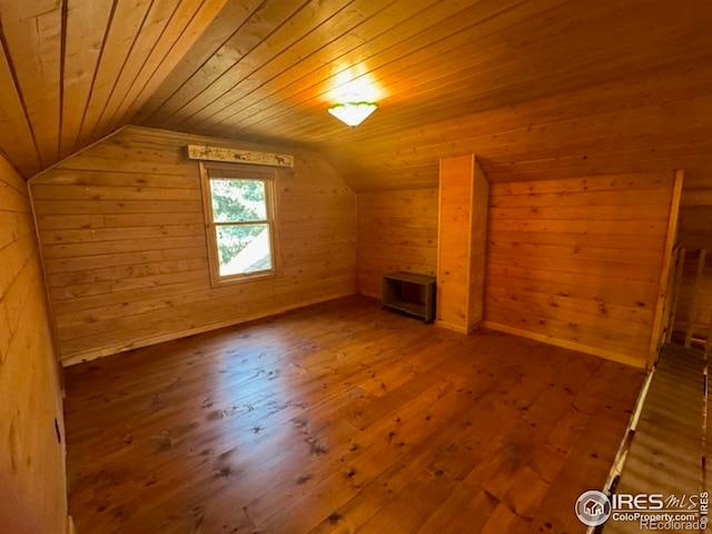 110 Meadow Ln, Bellvue, CO 80512 - bonus room featuring wooden walls, wooden ceiling, hardwood / wood-style flooring, and lofted ceiling