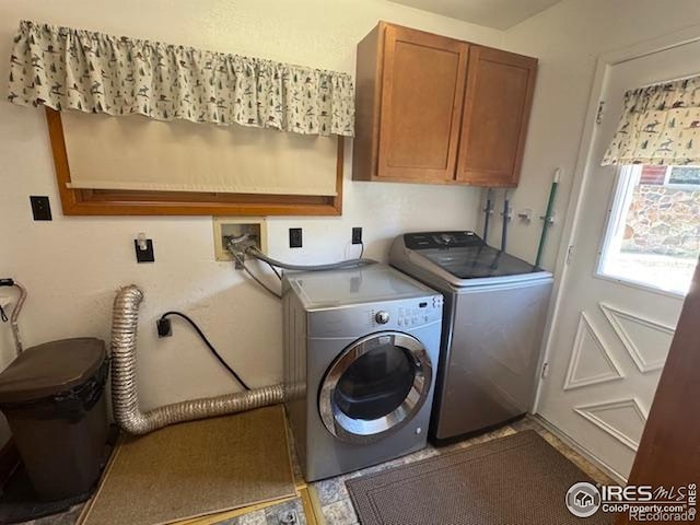 110 Meadow Ln, Bellvue, CO 80512 - laundry room with cabinet space and washing machine and dryer