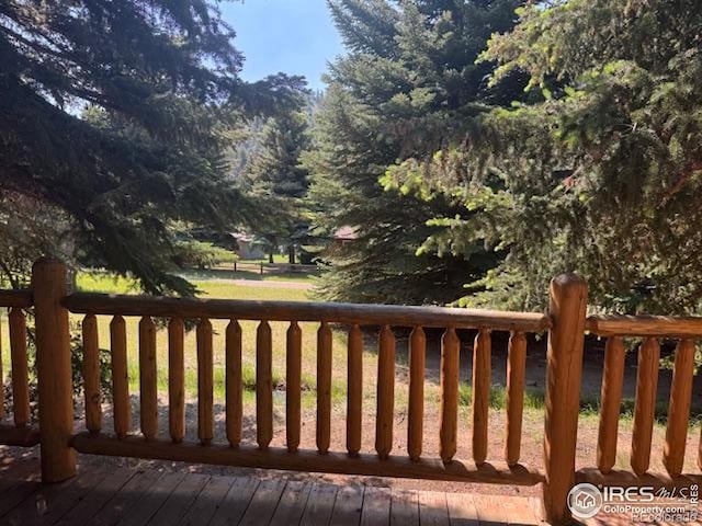 110 Meadow Ln, Bellvue, CO 80512 - wooden terrace with a lawn