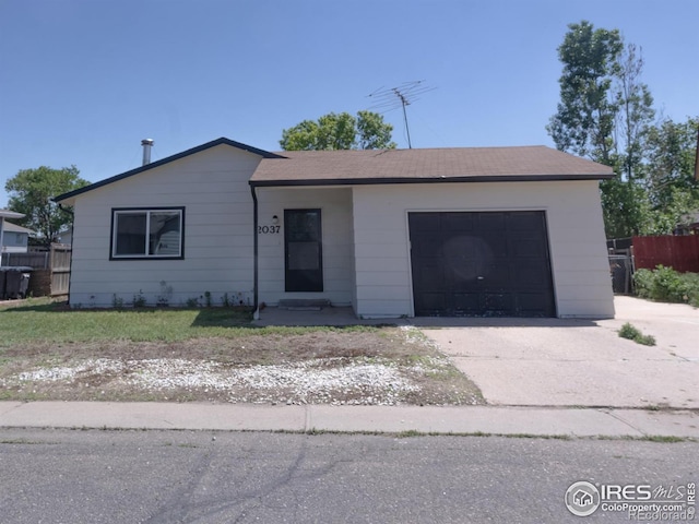 2037 Wedgewood Ct, Greeley, CO 80631 - ranch-style house with driveway and an attached garage