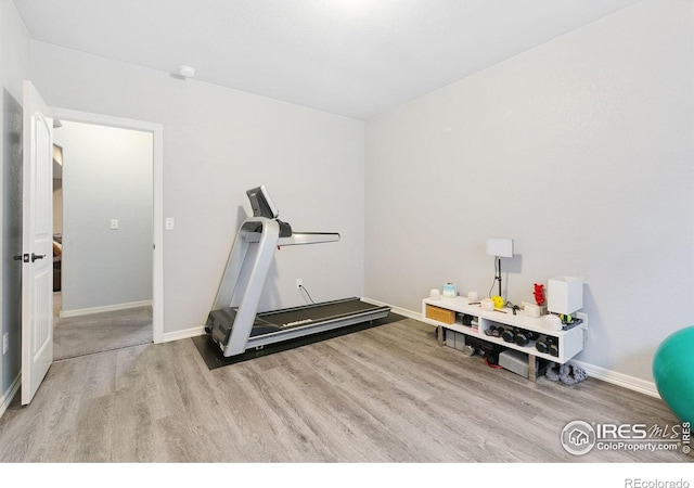 641 Babine Ct, Windsor, CO 80550 - exercise area with wood finished floors