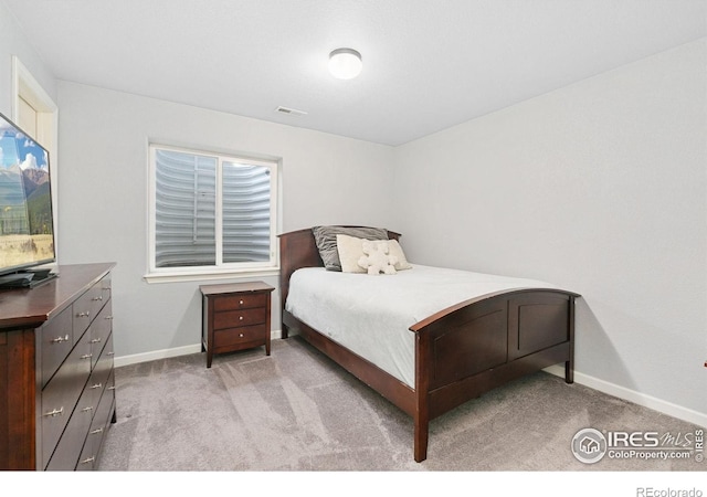 641 Babine Ct, Windsor, CO 80550 - carpeted bedroom with baseboards