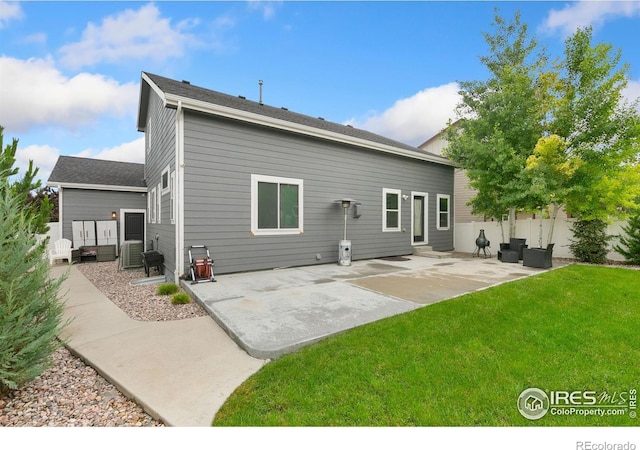 641 Babine Ct, Windsor, CO 80550 - rear view of house featuring a patio and entry steps