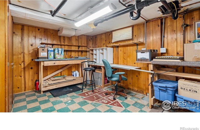 1817 15th Ave, Greeley, CO 80631 - home office featuring wood walls and tile patterned floors