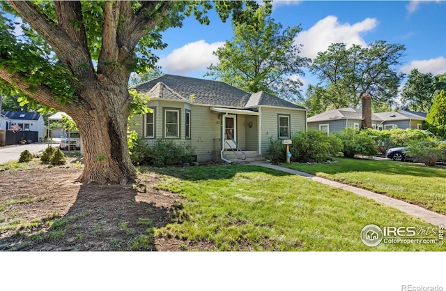 1817 15th Ave, Greeley, CO 80631 - view of front of home with a front lawn