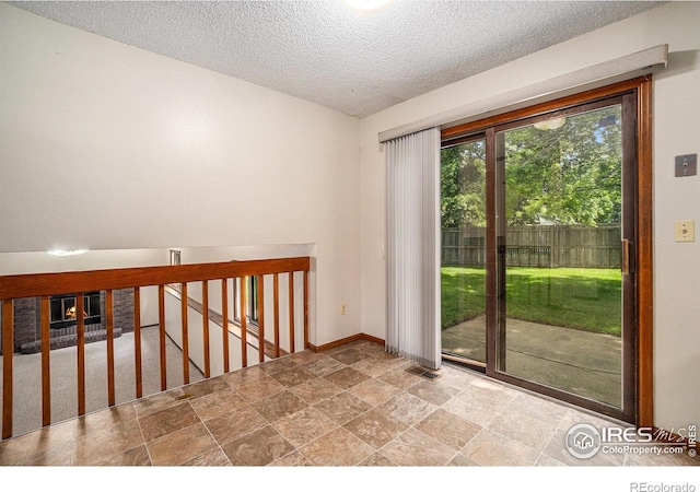 837 Arbor Ave, Fort Collins, CO 80526 - unfurnished room with a textured ceiling and baseboards