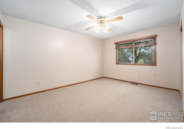 837 Arbor Ave, Fort Collins, CO 80526 - carpeted empty room with ceiling fan and a textured ceiling