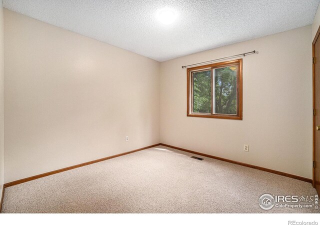 837 Arbor Ave, Fort Collins, CO 80526 - carpeted empty room featuring a textured ceiling and recessed lighting