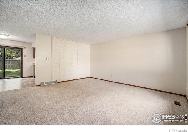 837 Arbor Ave, Fort Collins, CO 80526 - carpeted empty room featuring a textured ceiling and baseboards