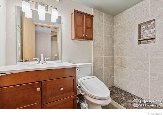 2217 Waylon Dr, Johnstown, CO 80534 - full bathroom featuring vanity and tiled shower