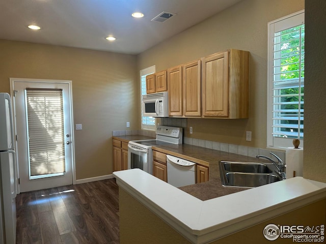 1238 Finch St, Loveland, CO 80537 - kitchen with white appliances, dark wood-style flooring, recessed lighting, a peninsula, and light brown cabinetry