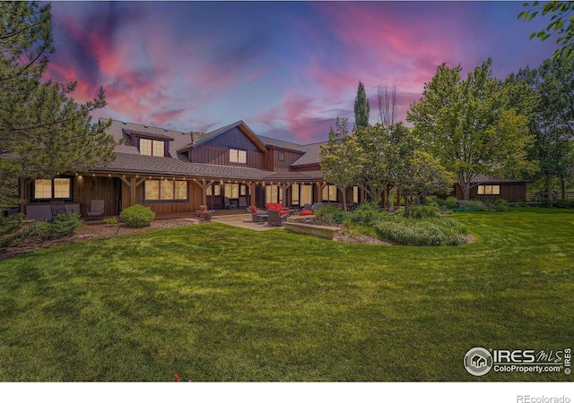 8576 Niwot Meadow Farm Rd, Niwot, CO 80503 - rear view of house with a yard and a patio
