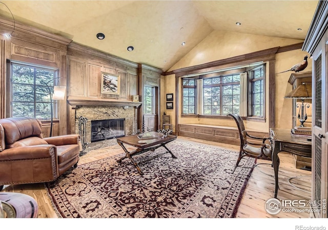 8576 Niwot Meadow Farm Rd, Niwot, CO 80503 - living area with wood-type flooring, a fireplace, and high vaulted ceiling