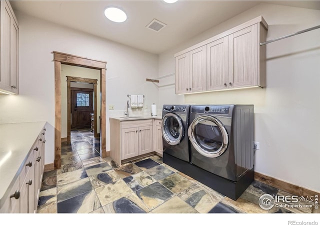 8576 Niwot Meadow Farm Rd, Niwot, CO 80503 - laundry room with cabinet space and separate washer and dryer