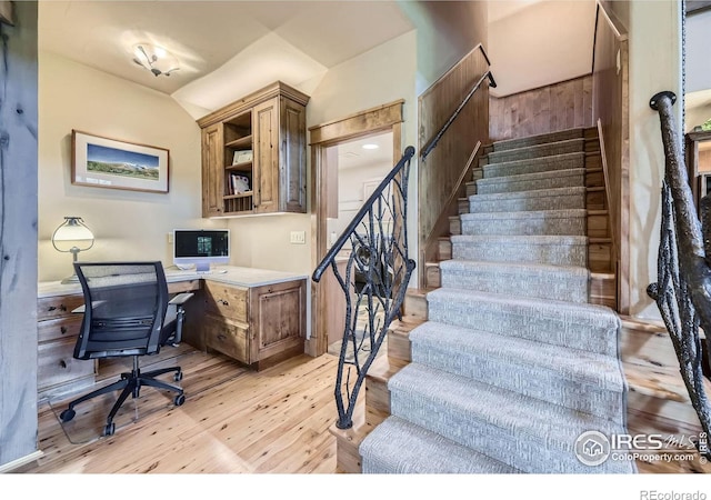 8576 Niwot Meadow Farm Rd, Niwot, CO 80503 - office area with light wood-style flooring, built in study area, and lofted ceiling