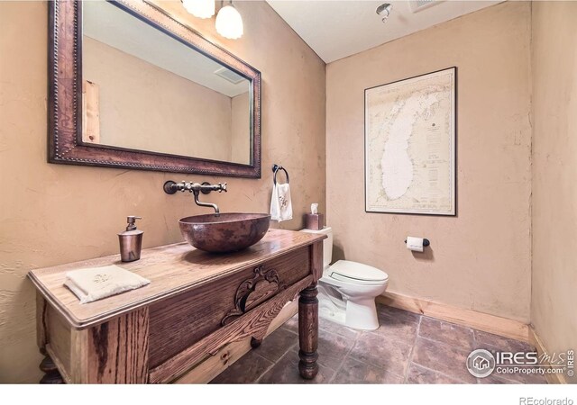 8576 Niwot Meadow Farm Rd, Niwot, CO 80503 - bathroom with vanity and toilet