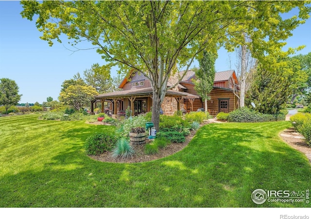 8576 Niwot Meadow Farm Rd, Niwot, CO 80503 - view of green lawn featuring a porch
