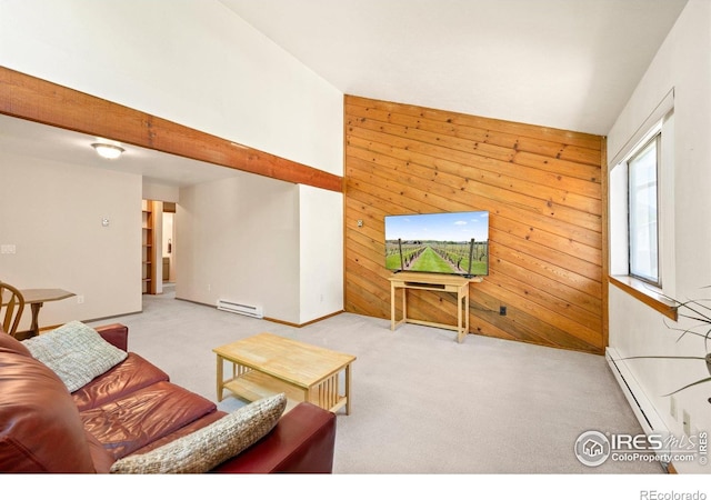 4717 Tantra Dr Unit G, Boulder, CO 80305 - carpeted living area with baseboard heating, lofted ceiling, wooden walls, and a baseboard heating unit