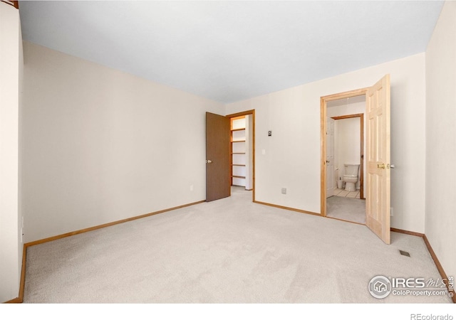 4717 Tantra Dr Unit G, Boulder, CO 80305 - unfurnished bedroom with carpet and connected bathroom