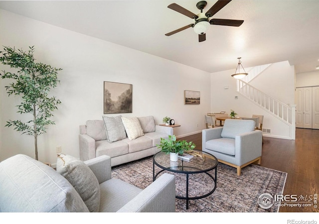702 Cairnes Dr Unit B4, Fort Collins, CO 80524 - living room featuring stairs, wood finished floors, and ceiling fan
