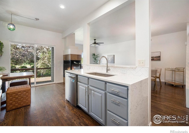 702 Cairnes Dr Unit B4, Fort Collins, CO 80524 - kitchen featuring gray cabinets, stainless steel dishwasher, backsplash, dark wood finished floors, and recessed lighting