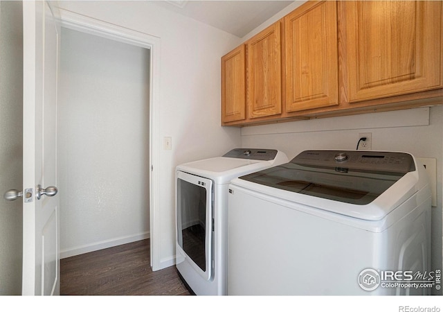702 Cairnes Dr Unit B4, Fort Collins, CO 80524 - laundry room featuring independent washer and dryer, dark wood finished floors, and cabinet space