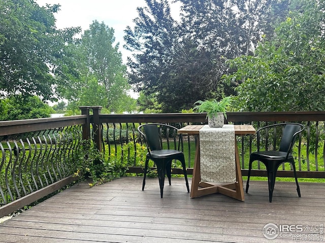 702 Cairnes Dr Unit B4, Fort Collins, CO 80524 - view of wooden terrace