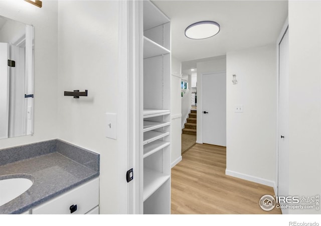 2036 Lexington Ct, Fort Collins, CO 80526 - bathroom with wood finished floors and vanity