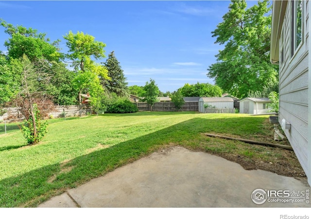 2036 Lexington Ct, Fort Collins, CO 80526 - view of yard with a storage shed and a patio