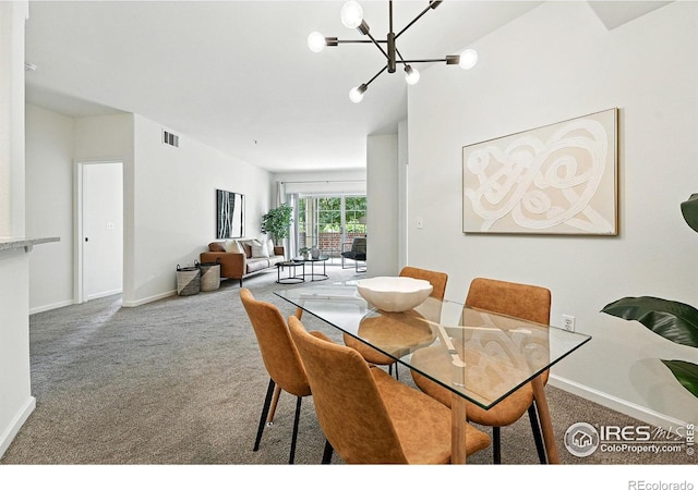 530 Mohawk Dr Unit 73, Boulder, CO 80303 - carpeted dining area with baseboards and a chandelier
