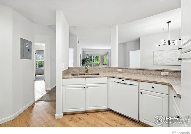 530 Mohawk Dr Unit 73, Boulder, CO 80303 - kitchen featuring white dishwasher, light wood-style floors, electric panel, and white cabinets