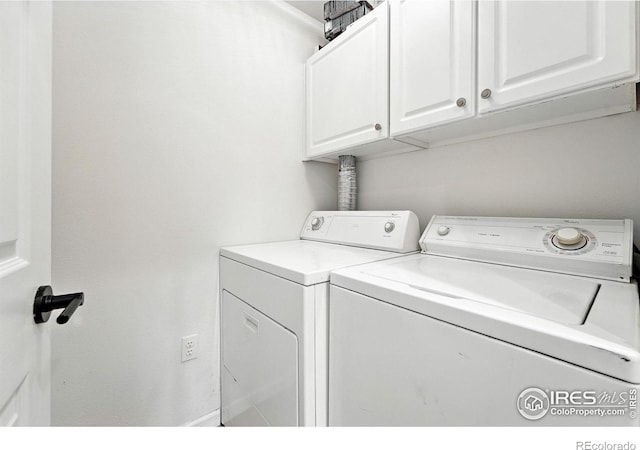 530 Mohawk Dr Unit 73, Boulder, CO 80303 - laundry area featuring cabinet space and separate washer and dryer