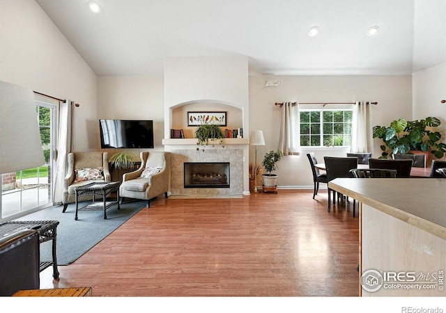 530 Mohawk Dr Unit 73, Boulder, CO 80303 - living area with wood finished floors, a premium fireplace, and recessed lighting