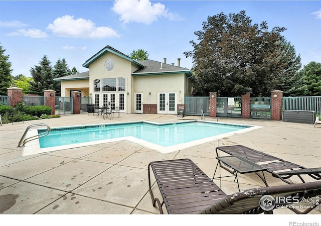 530 Mohawk Dr Unit 73, Boulder, CO 80303 - community pool with french doors and a patio