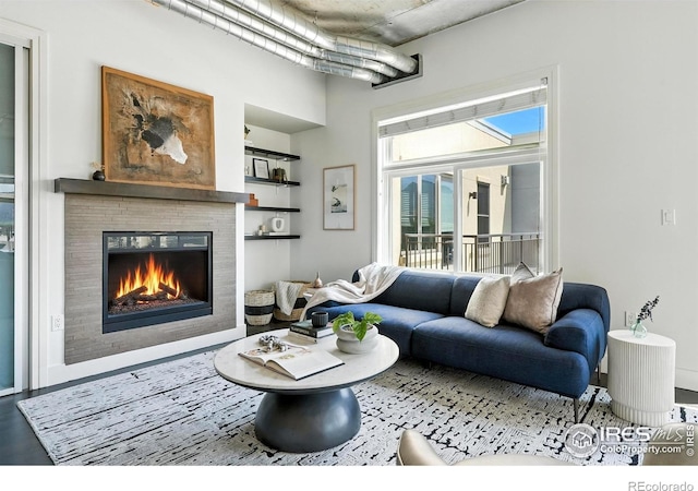 3401 Arapahoe Ave Unit 420, Boulder, CO 80303 - living room featuring a glass covered fireplace