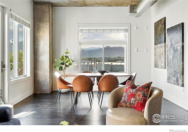 3401 Arapahoe Ave Unit 420, Boulder, CO 80303 - dining space with wood finished floors, healthy amount of natural light, and a mountain view