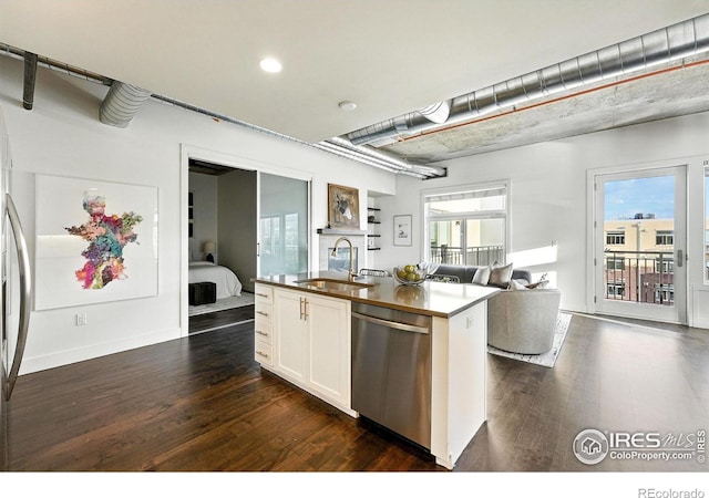 3401 Arapahoe Ave Unit 420, Boulder, CO 80303 - kitchen featuring dishwasher, dark wood-style flooring, open floor plan, a kitchen island with sink, and recessed lighting
