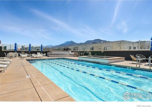3401 Arapahoe Ave Unit 420, Boulder, CO 80303 - community pool with a mountain view, a patio area, and a hot tub