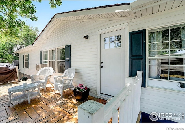 2036 1st Ave Unit 437, Greeley, CO 80631 - wooden deck with a grill