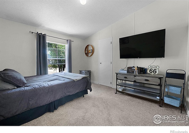 2036 1st Ave Unit 437, Greeley, CO 80631 - carpeted bedroom featuring a textured ceiling