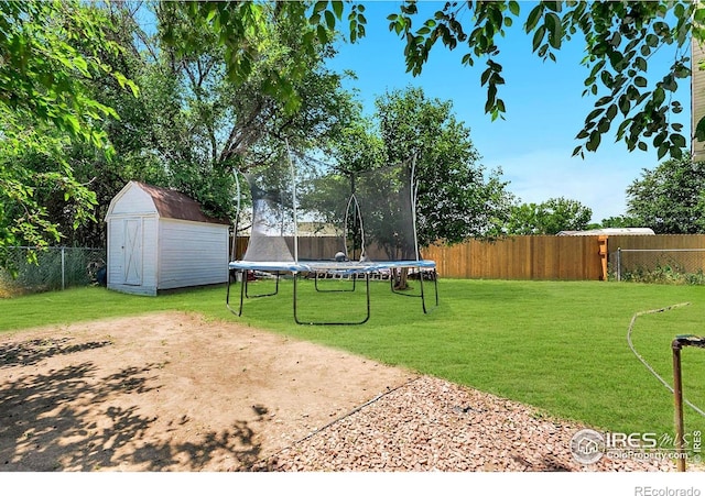 2036 1st Ave Unit 437, Greeley, CO 80631 - fenced backyard featuring a trampoline and a storage shed