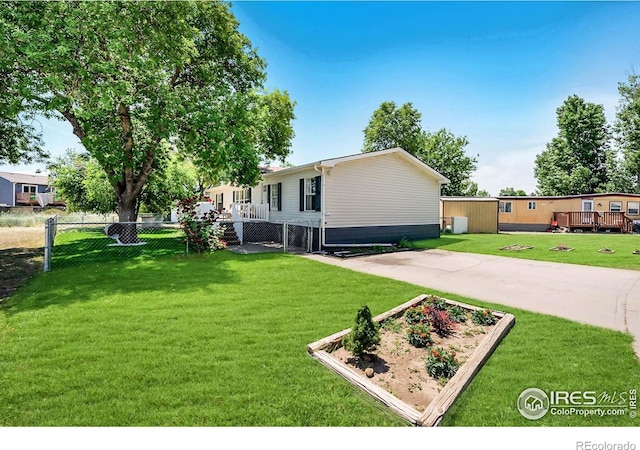 2036 1st Ave Unit 437, Greeley, CO 80631 - view of yard featuring a garden