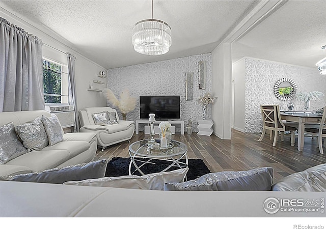 2036 1st Ave Unit 437, Greeley, CO 80631 - living area featuring a textured ceiling, a chandelier, wood finished floors, and cooling unit