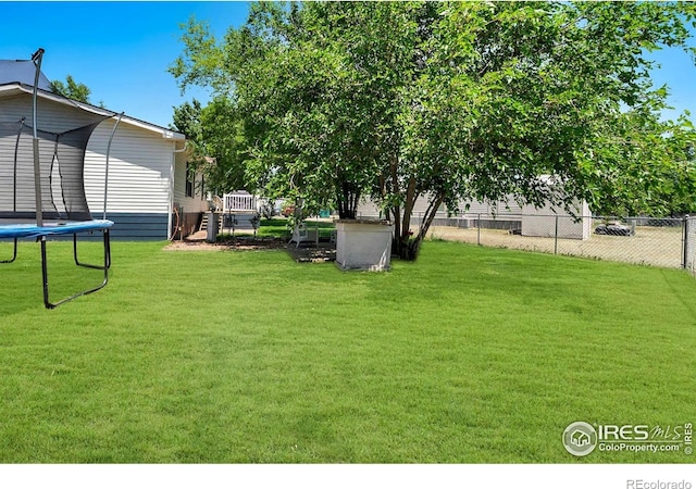 2036 1st Ave Unit 437, Greeley, CO 80631 - view of yard with a trampoline