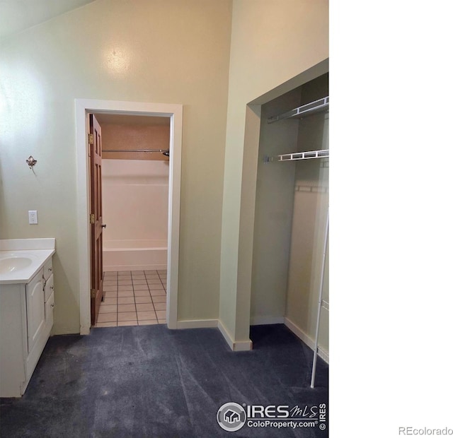 1550 W 28th St Unit 1, Loveland, CO 80538 - bathroom featuring vanity and tile patterned flooring