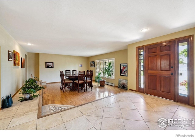 2513 Lanyon Dr, Longmont, CO 80503 - dining room featuring a baseboard heating unit, tile patterned flooring, and recessed lighting