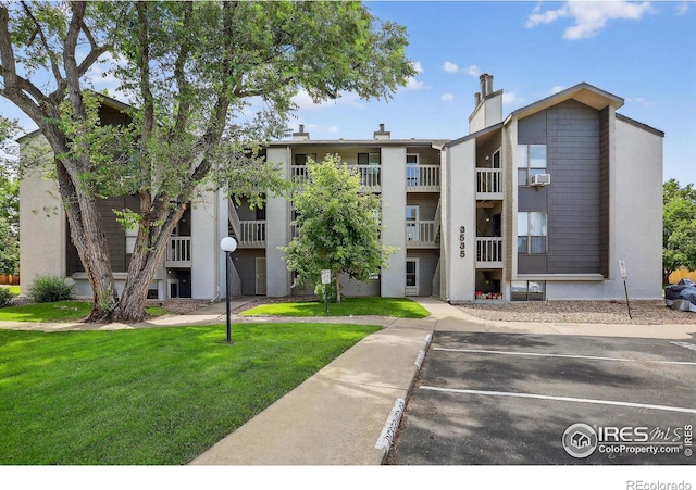 3535 28th St # 202, Boulder, CO 80301 - view of building exterior with uncovered parking