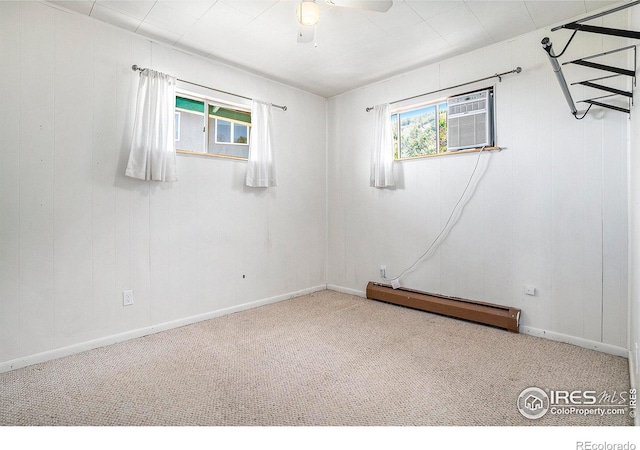 5017 Overhill Dr, Fort Collins, CO 80526 - spare room with a baseboard heating unit, carpet flooring, and ceiling fan