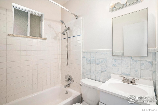 5017 Overhill Dr, Fort Collins, CO 80526 - full bath featuring  shower combination, vanity, and tile walls