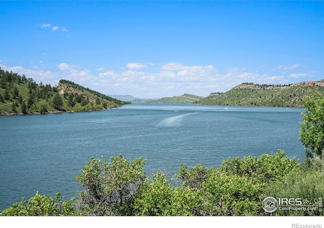 5017 Overhill Dr, Fort Collins, CO 80526 - water view with a mountainous background